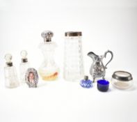 COLLECTION OF ANTIQUE SILVER COLLARED BOTTLES