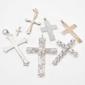 GROUP OF SILVER CRUCIFIX PENDANTS
