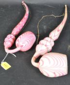 TWO VICTORIAN NAILSEA ORNAMENTAL GLASS PIPES IN WHITE & PINK SWIRLS