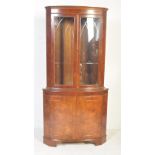 A 20TH CENTURY GEORGE III STYLE CORNER DISPLAY CABINET