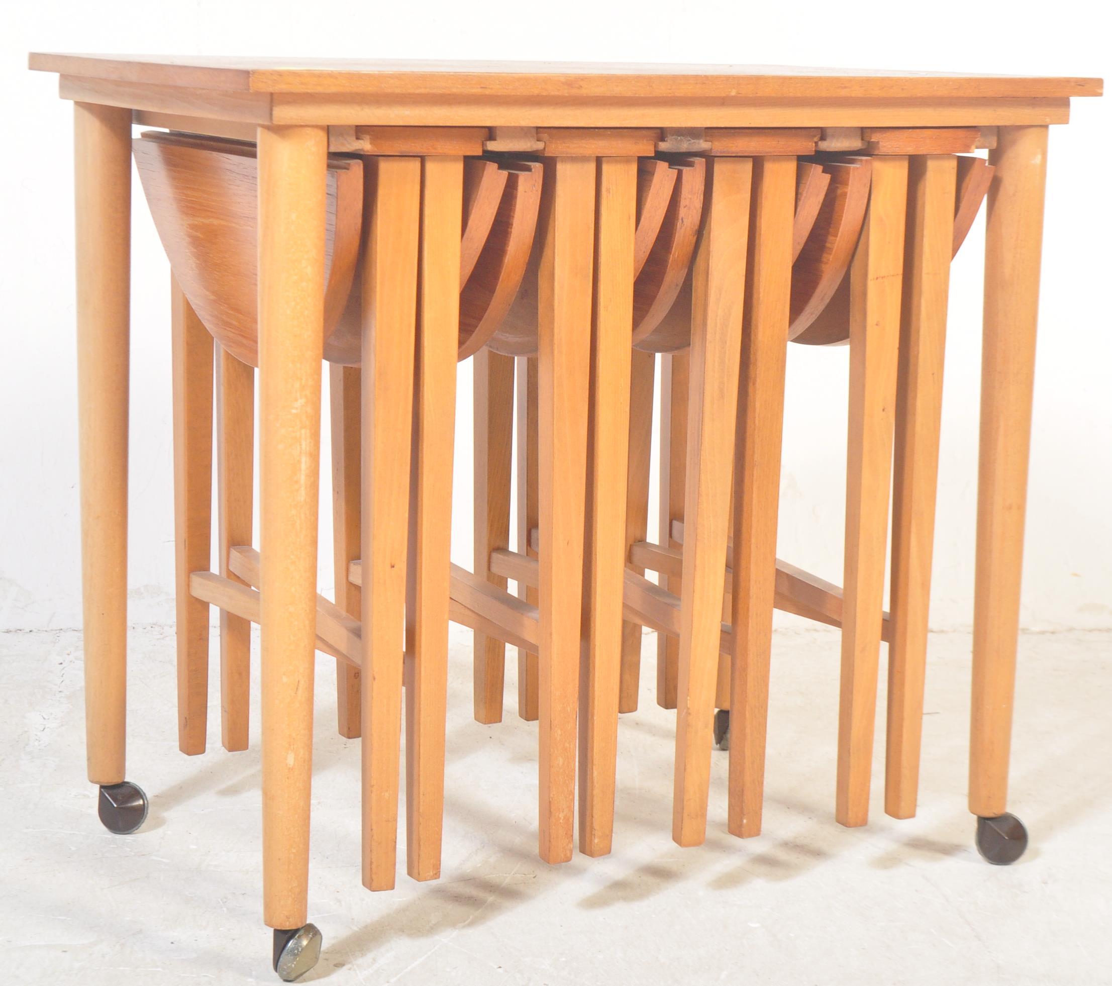 1960S TEAK DROP LEAF NEST OF TABLES