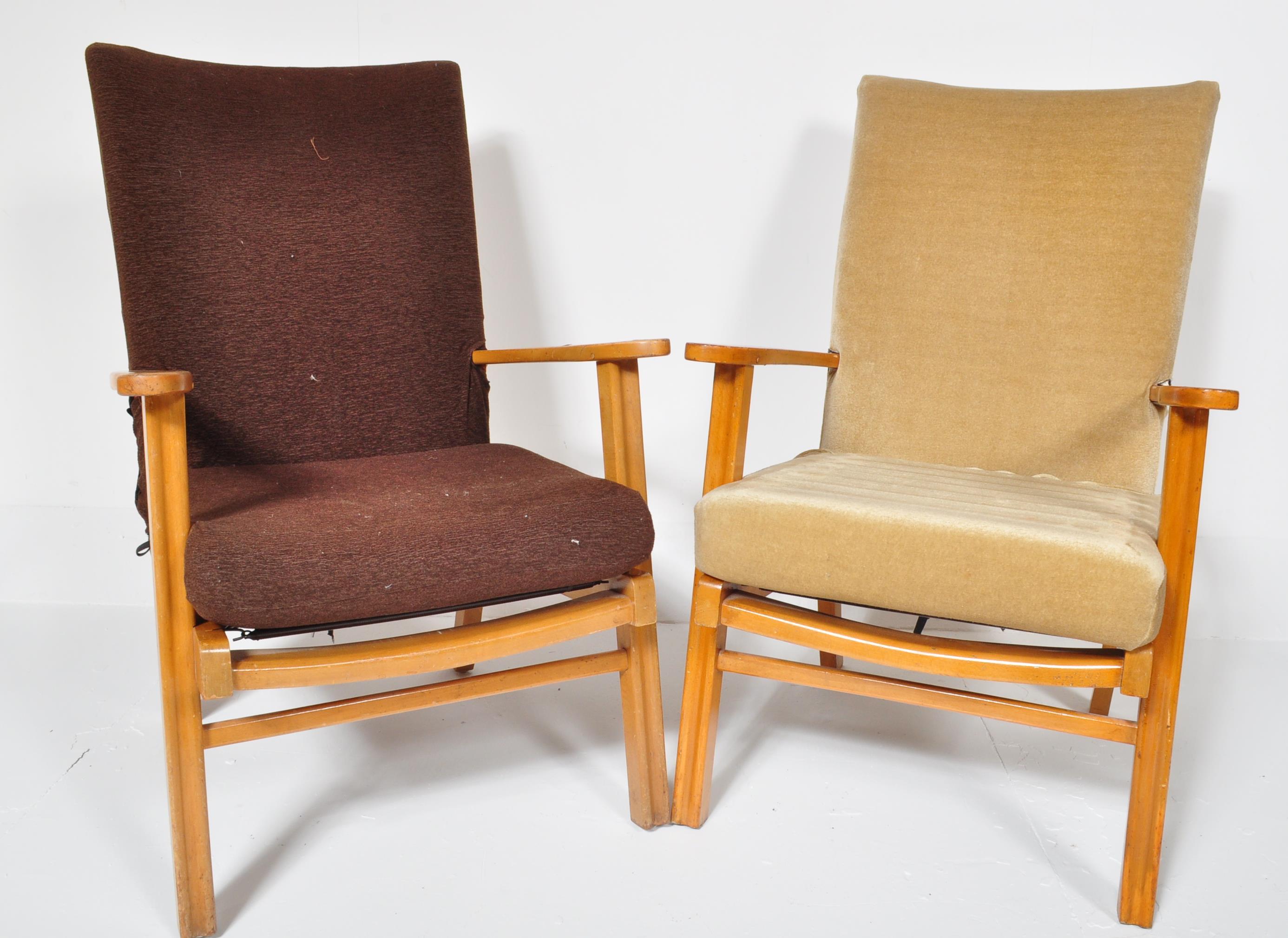 TWO VINTAGE MID CENTURY TEAK LOUNGE ARM CHAIRS