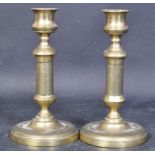 A PAIR OF VICTORIAN BRASS CANDLE STICK HOLDERS