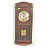 EARLY 20TH CENTURY MAHOGANY CASED WALL CLOCK