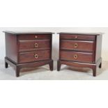PAIR OF STAG MAHOGANY MINSTREL PATTERN BEDSIDE CHESTS