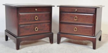 PAIR OF STAG MAHOGANY MINSTREL PATTERN BEDSIDE CHESTS