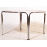 A RETRO VINTAGE ROUND PLASTIC & CHROME COFFEE OCCASIONAL TABLE