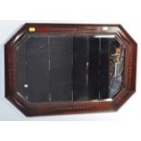 EARLY 20TH CENTURY CARVED OAK BEVELLED MIRROR