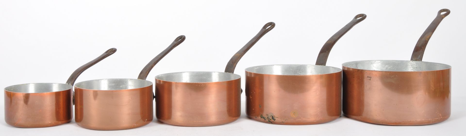 MATCHING SET OF FIVE FRENCH COPPER SAUCEPANS