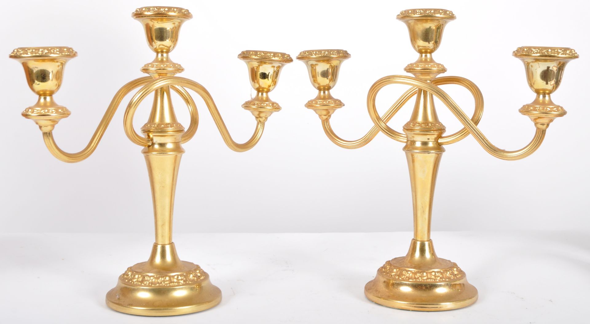 MATCHING PAIR OF HOLLYWOOD REGENCY GILT CANDELABRAS