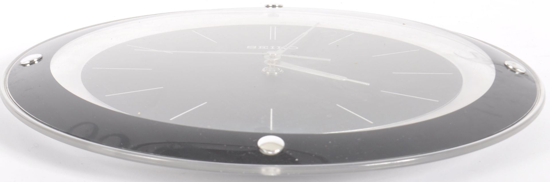 SEIKO - LATE 20TH CENTURY CLEAR AND BLACK PLASTIC CLOCK - Image 3 of 3