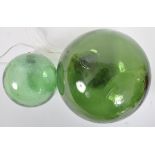 TWO EARLY TO MID 20TH CENTURY GLASS WITCHES BALLS