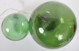 TWO EARLY TO MID 20TH CENTURY GLASS WITCHES BALLS