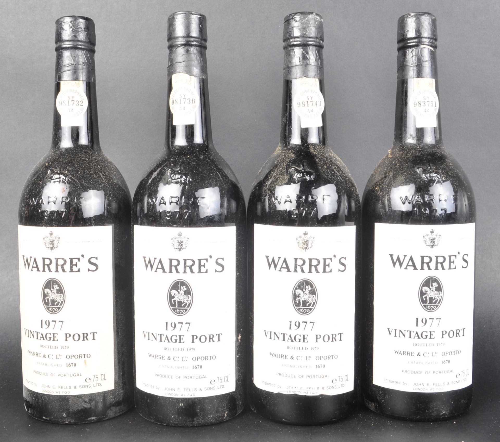 FOUR BOTTLES OF 1977 WARRE'S VINTAGE PORT