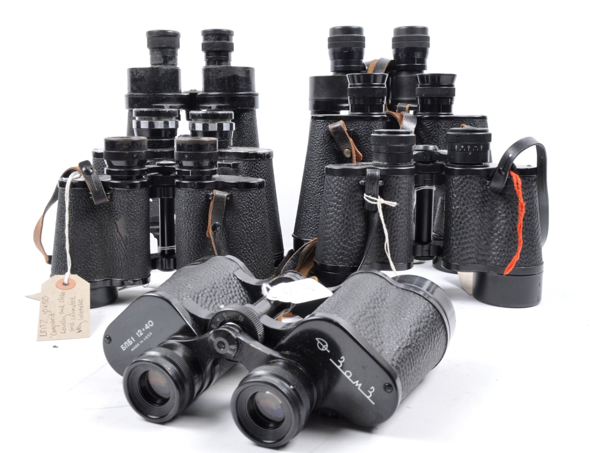 A COLLECTION OF ASSORTED VINTAGE BINOCULARS