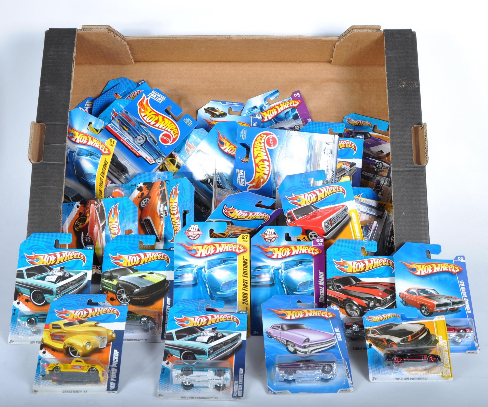 COLLECTION OF ASSORTED CARDED MATTEL HOT WHEELS DIECAST MODELS