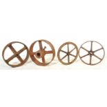 SELECTION OF VINTAGE 20TH CENTURY CAST IRON WHEELS