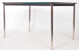 MANNER OF LE CORBUSIER - LC10 - CHROME AND GLASS DINING TABLE