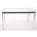 MANNER OF LE CORBUSIER - LC10 - CHROME AND GLASS DINING TABLE