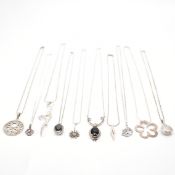 COLLECTION OF SILVER PENDANT NECKLACES
