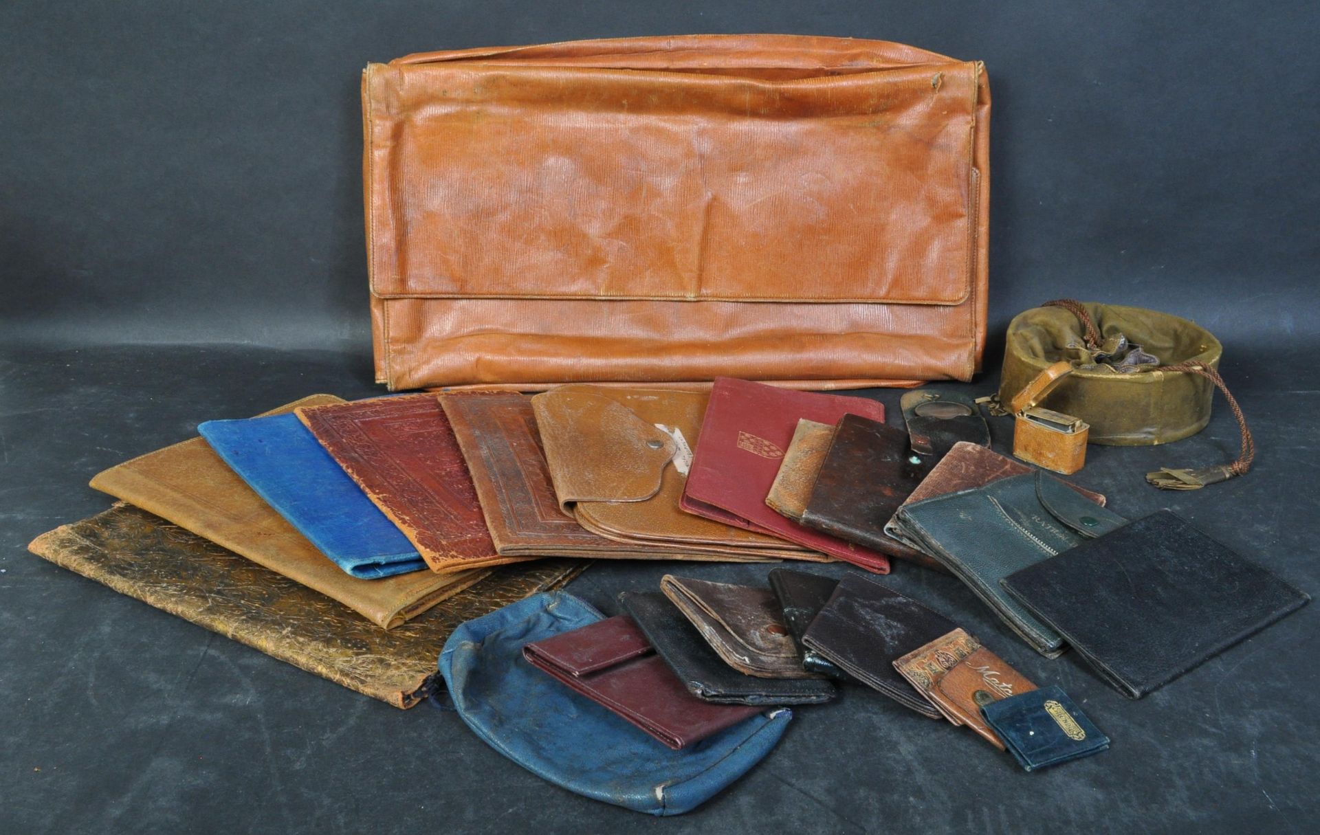 COLLECTION OF 20TH CENTURY LEATHER BINDINGS & WALLETS