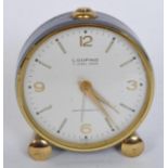 VINTAGE MID CENTURY ENAMELLED LOOPING ALARM CLOCK