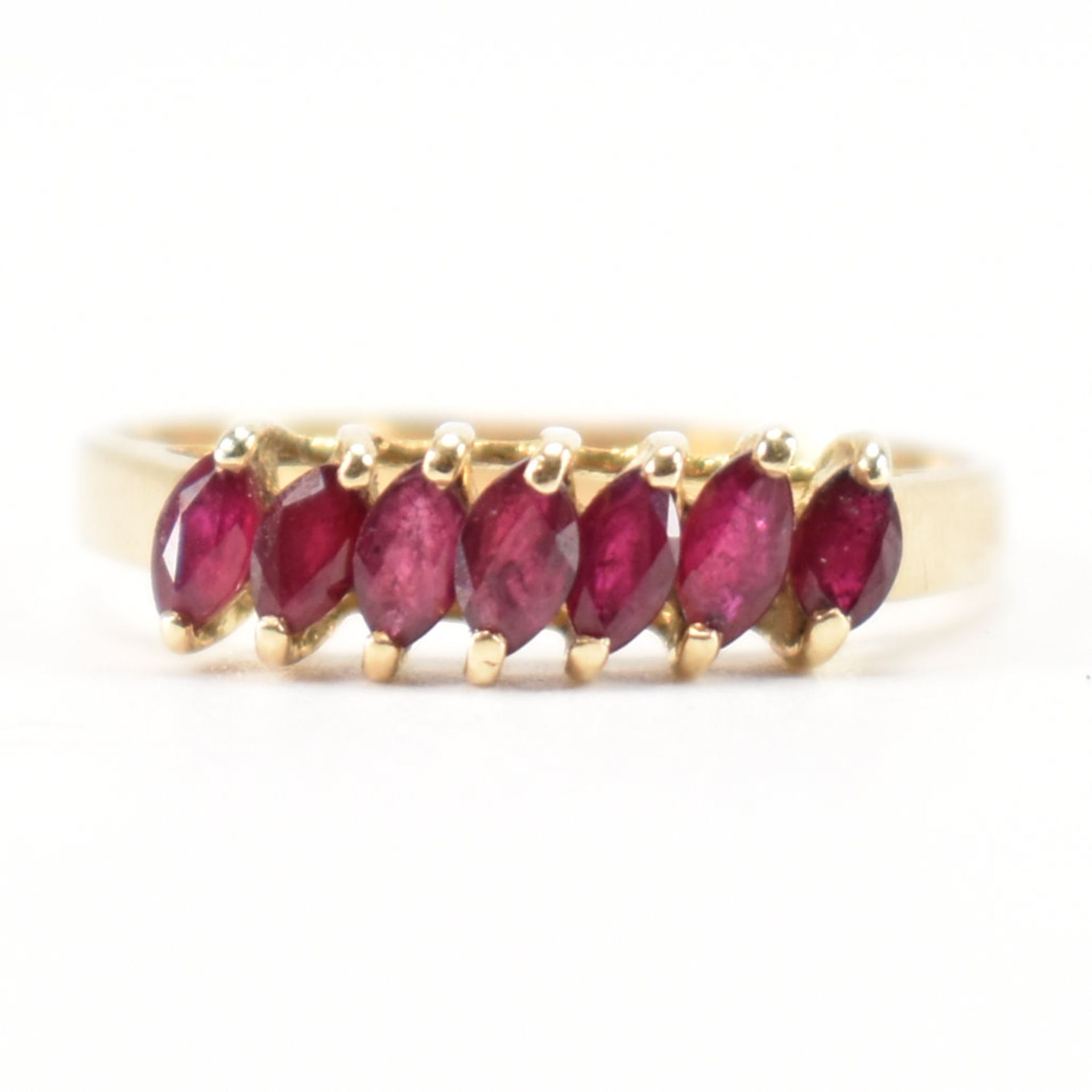 GOLD & RUBY SEVEN STONE RING