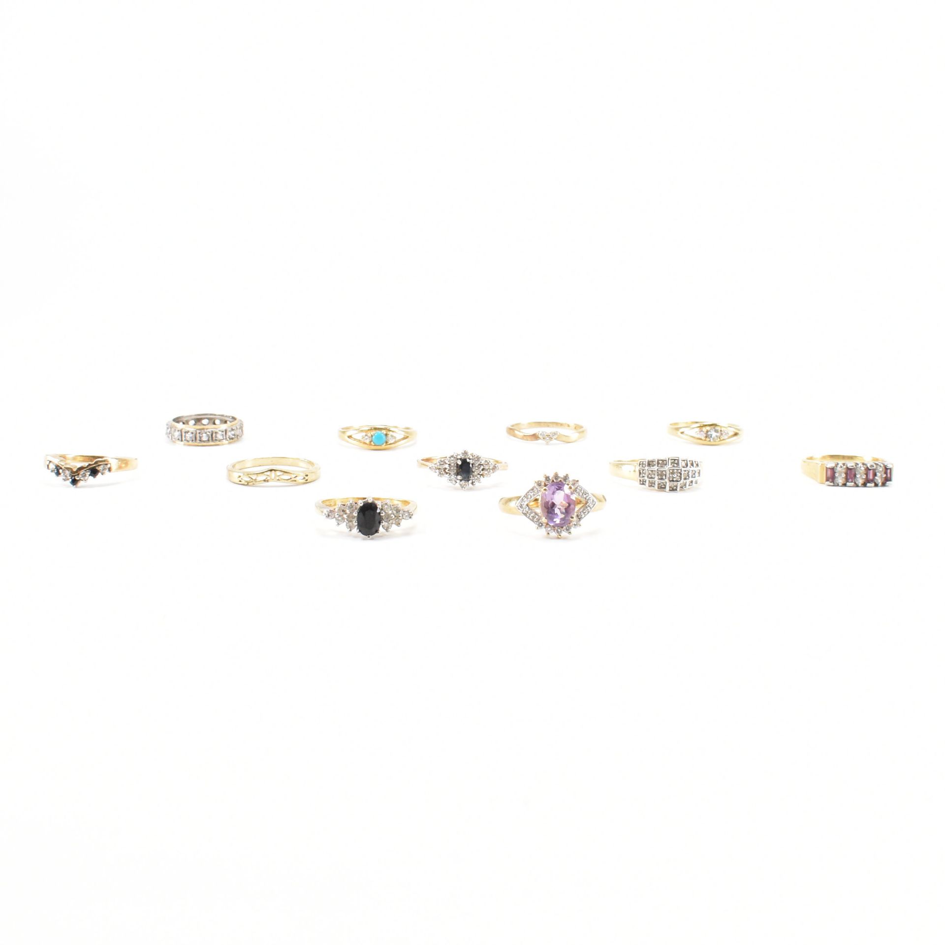 COLLECTION OF GOLD ON SILVER GEM SET RINGS