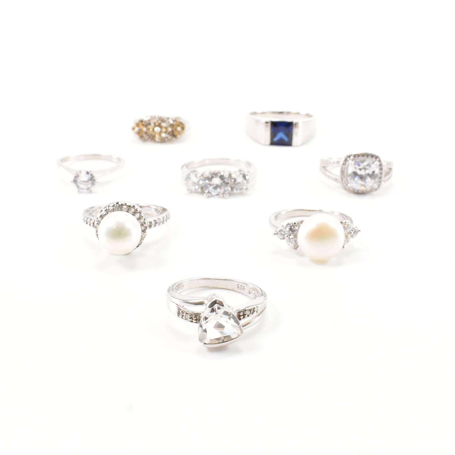 COLLECTION OF EIGHT 925 SILVER GEMSTONE SET RINGS
