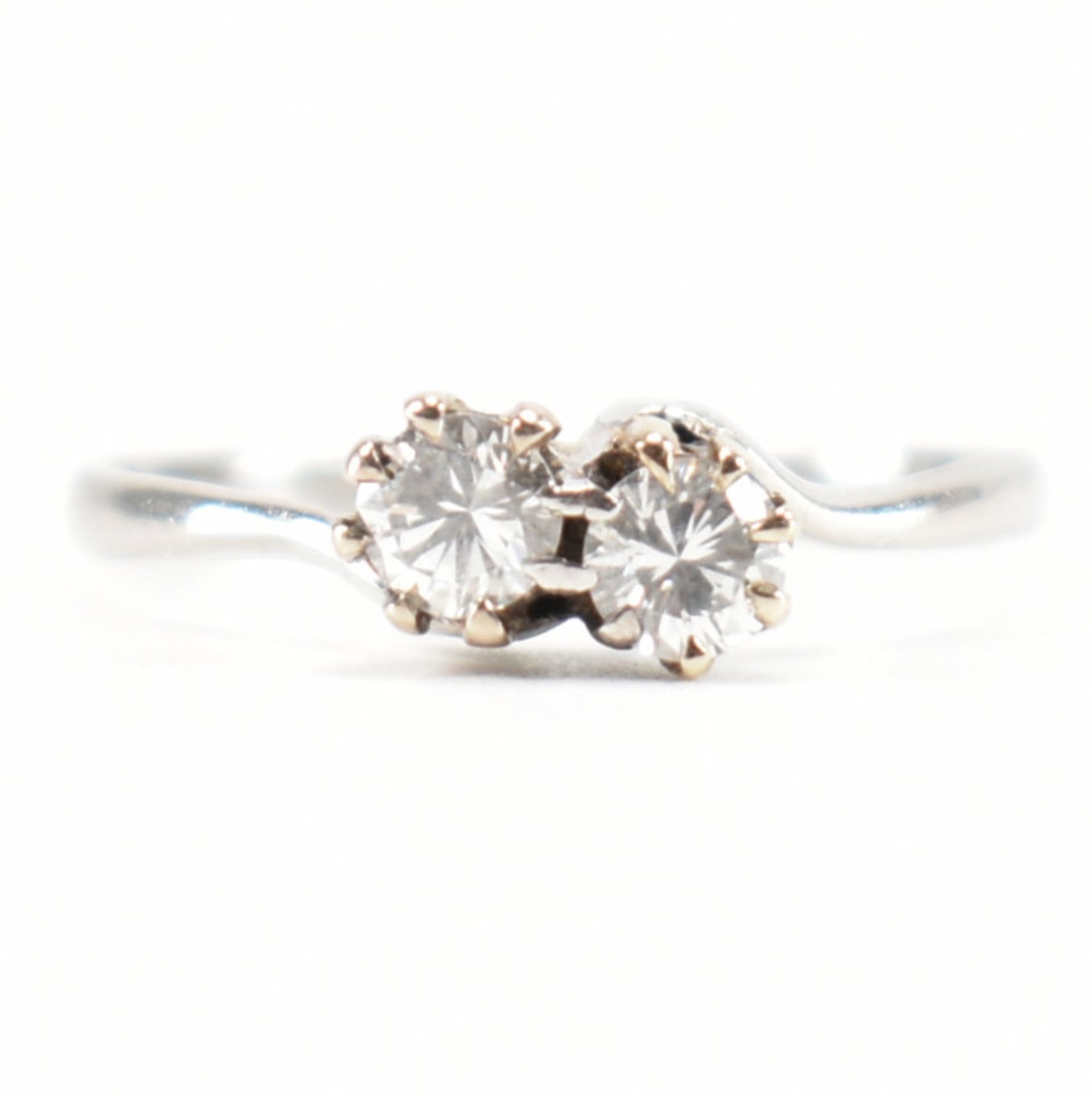 PLATINUM & DIAMOND 2 STONE CROSSOVER RING