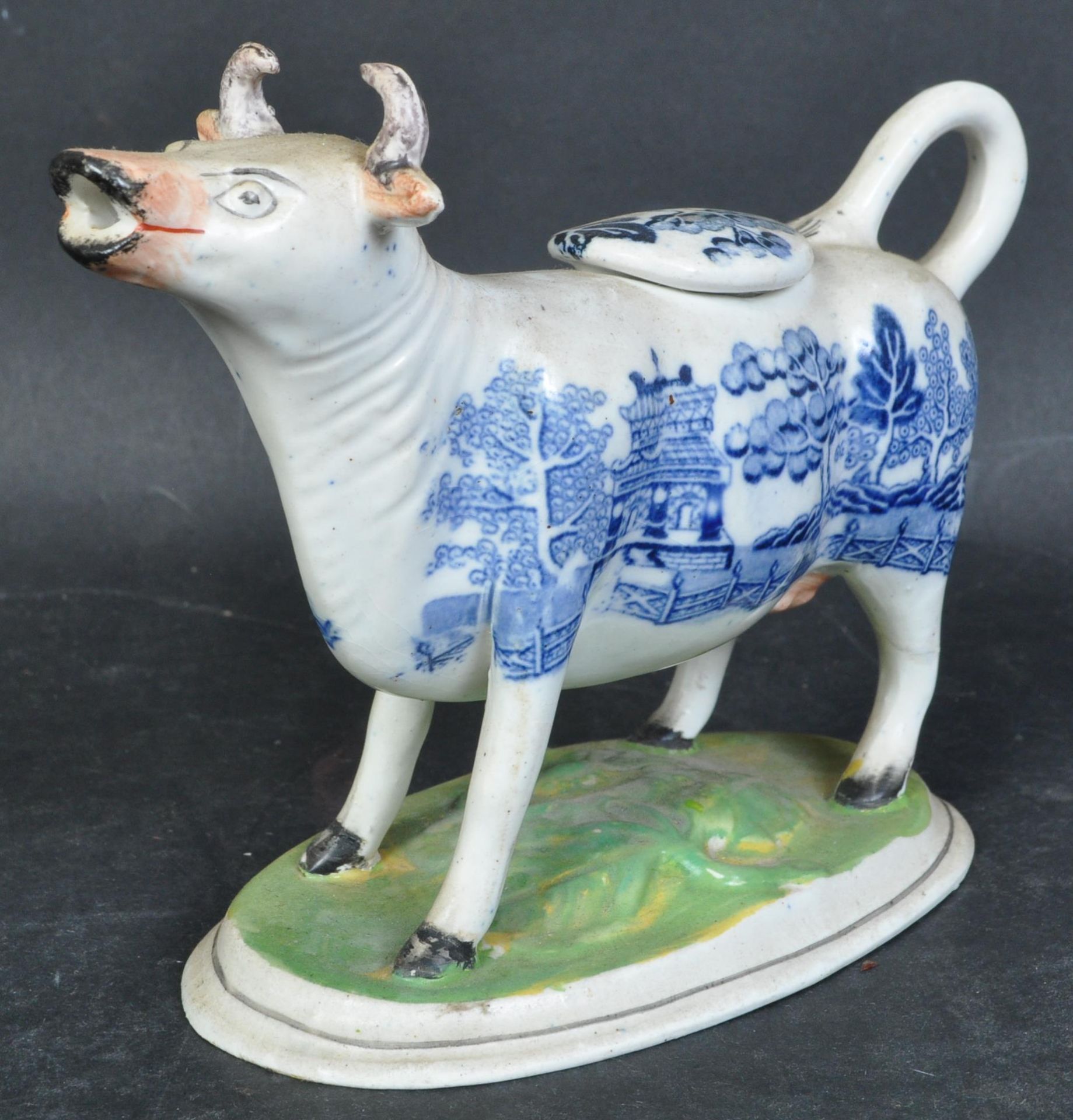 19TH STAFFORDSHIRE PORCELAIN COW CREAMER FIGURE