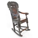 17TH CENTURY CARVED OAK ROCKING CHAIR