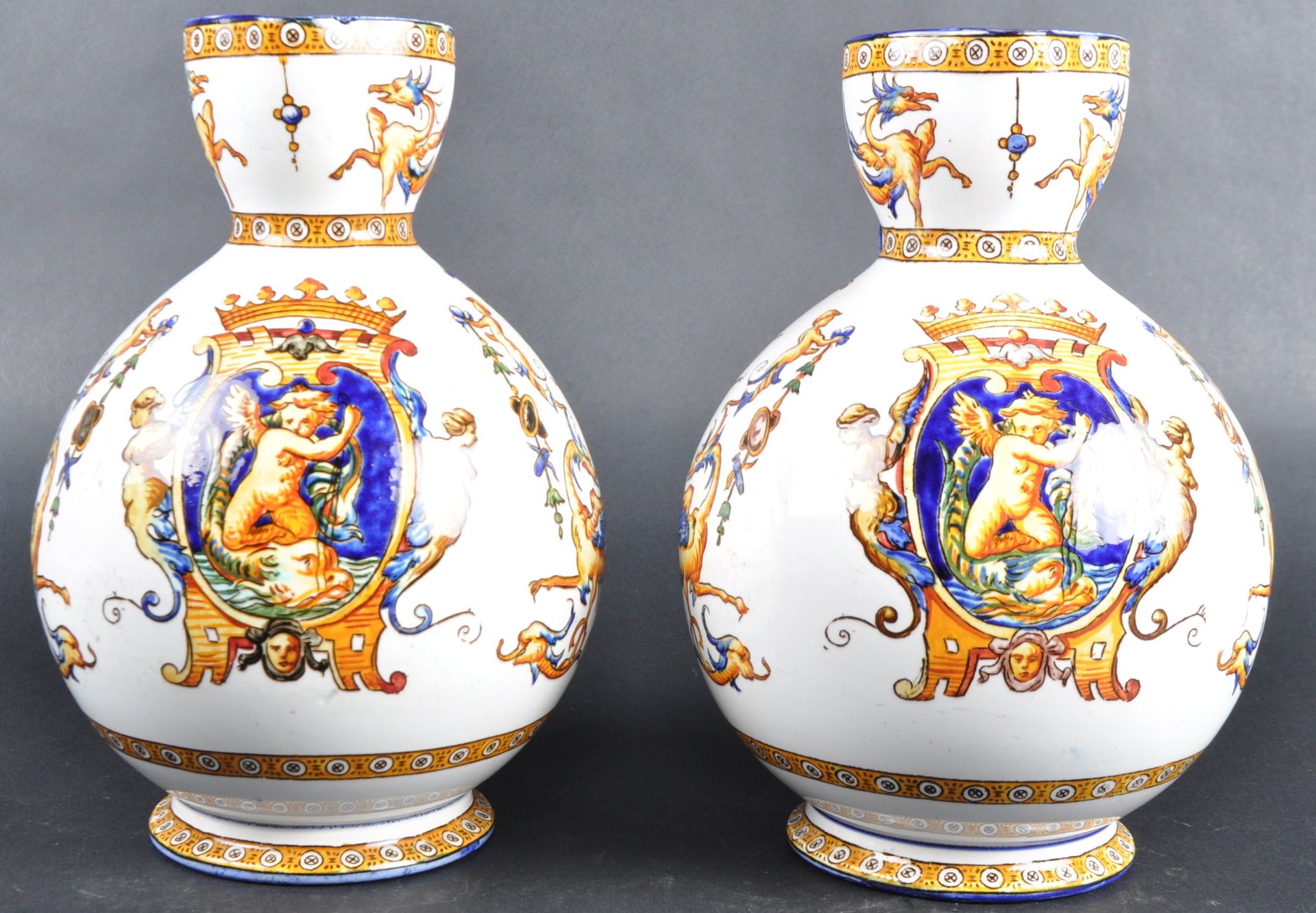 PAIR OF MID 19TH CENTURY ITALIAN FAIENCE POTTERY JUGS