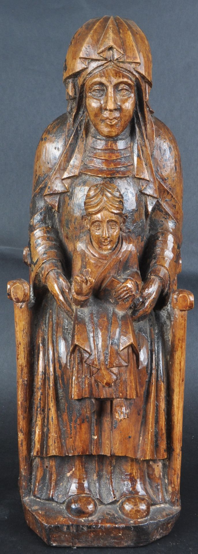 18TH CENTURY CARVED WALNUT RELIGIOUS ENTHRONED FIGURE