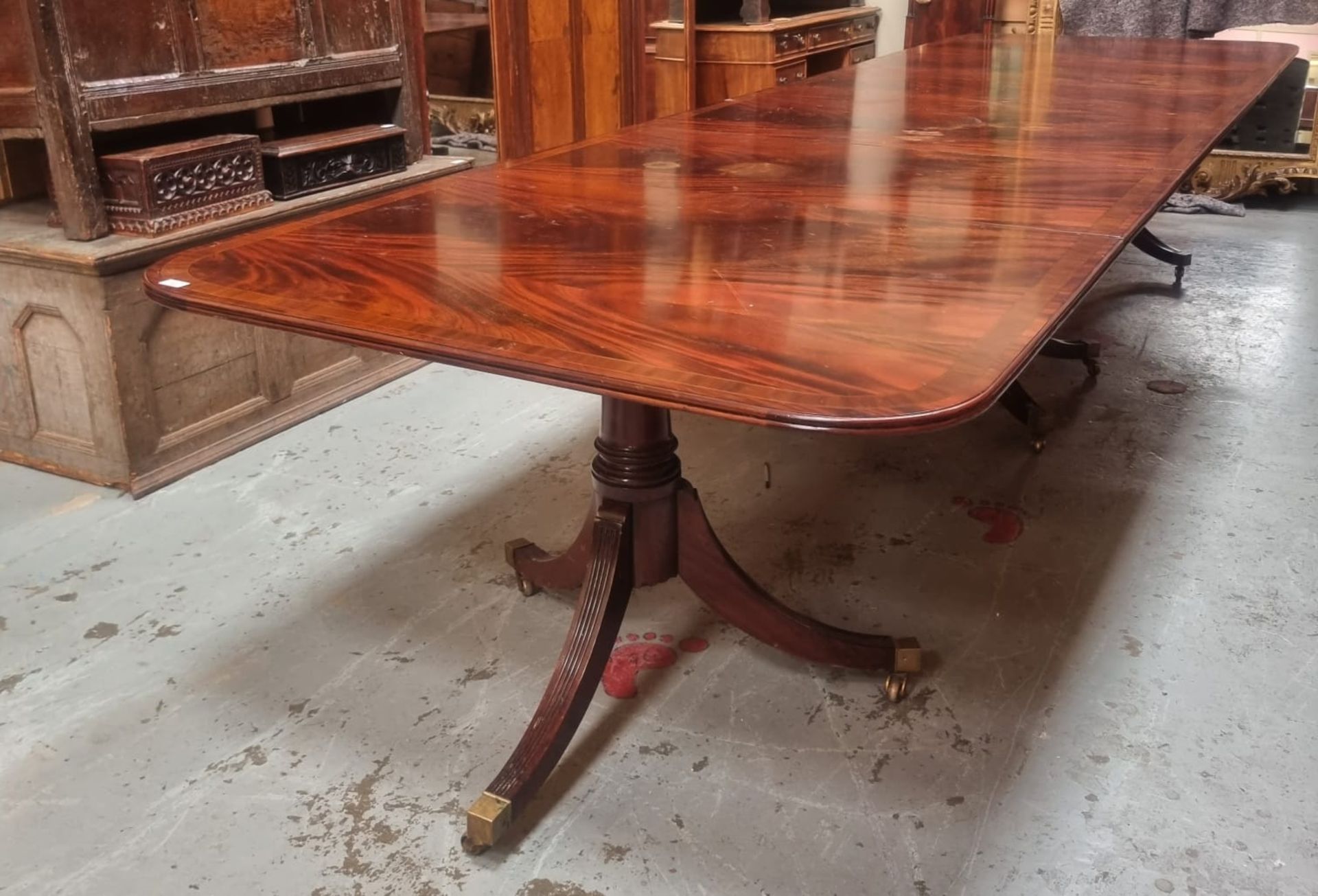 REGENCY STYLE INLAID MAHOGANY TRIPLE PESESTAL DINING TABLE