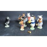 EIGHT BESWICK PIG PROM PORCELAIN FIGURINES