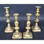 TWO PAIRS OF 19TH & 20TH CENTURY BRASS CANDLESTICKS