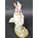 19TH CENTURY STAFFORDSHIRE CERAMIC MOTHER GOOSE