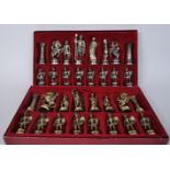 TWO BOXED SETS OF ROMAN SPELTER CHESS PIECES
