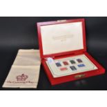 SET OF SEVEN SILVER .925 HALLMARKED COMMEMORATIVE STAMPS