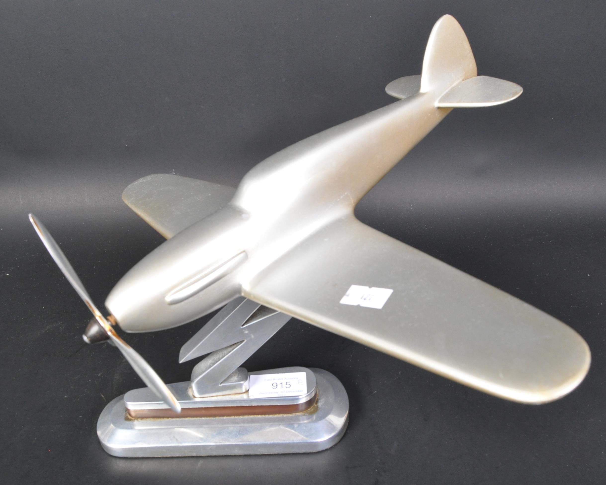 MODEL OF A WOODEN SPITFIRE ON METAL BASE