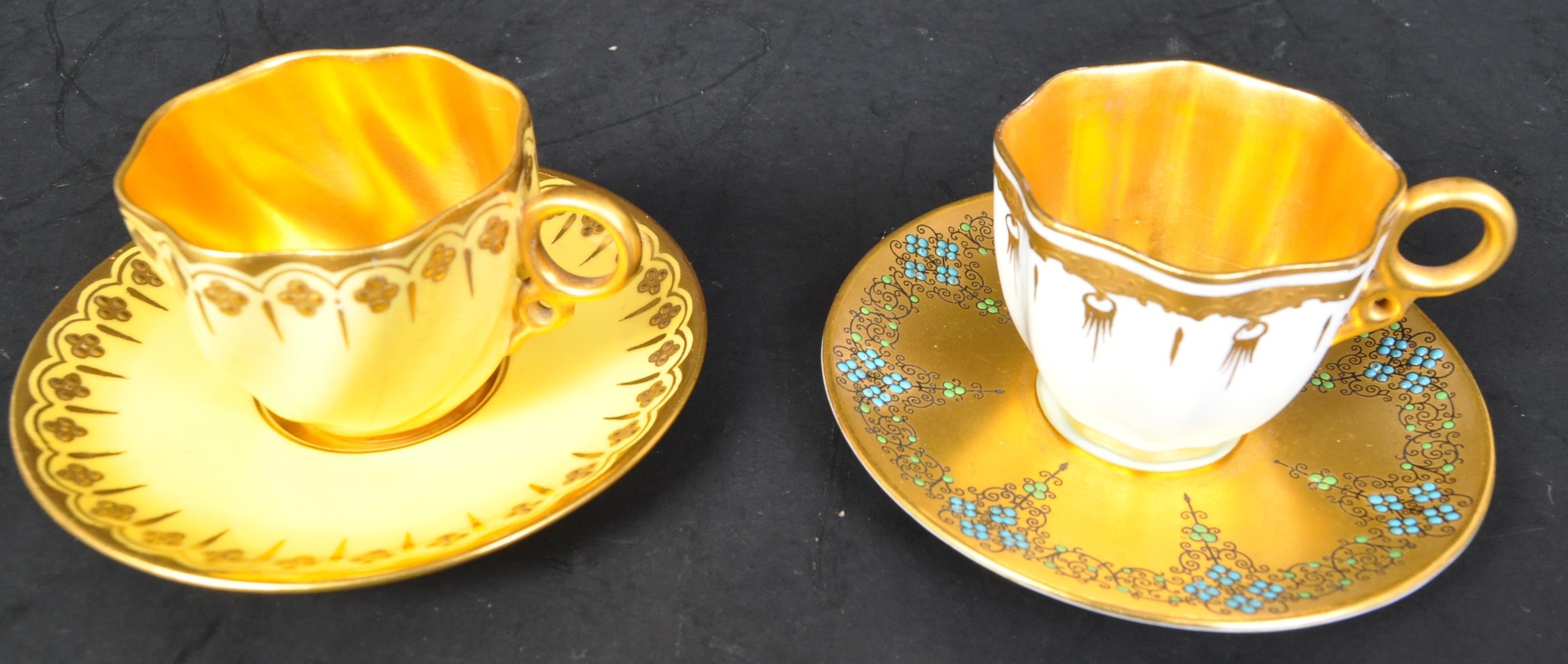 TWO EARLY 20TH CENTURY COALPORT WITH ANOTHER CUPS & SAUCERS