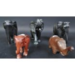 COLLECTION OF FIVE WOODEN ELEPHANT STATUES