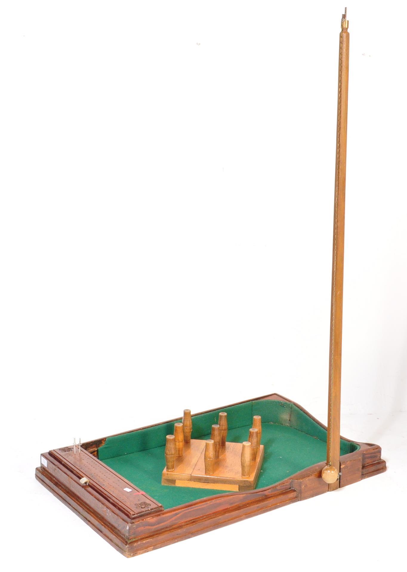 EARLY 20TH CENTURY MAHOGANY TABLE TOP SKITTLES GAME