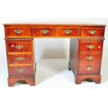 GEORGE III REVIVAL MAHOGANY AND LEATHER DESK & CABINET