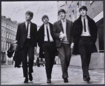 THE BEATLES - 8X10" PHOTOGRAPH SIGNED BY ALL FOUR MEMBERS