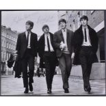 THE BEATLES - 8X10" PHOTOGRAPH SIGNED BY ALL FOUR MEMBERS
