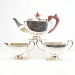 A GEORGE V SILVER TEAPOT WITH SUGAR BOWL & CREAMER