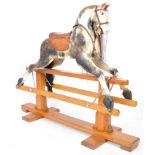 LARGE 20TH CENTURY HAND PAINTED ROCKING HORSE