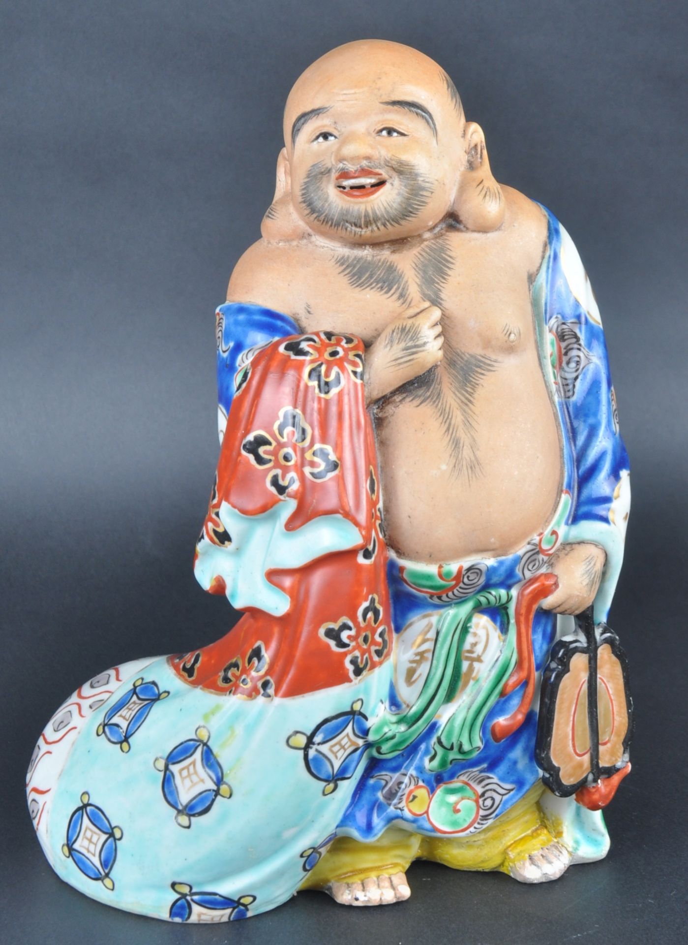 20TH CENTURY POTTERY LAUGHING BUDDHA FIGURINE